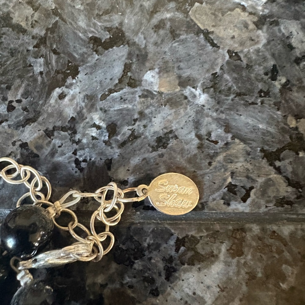 Sophisticated Black Beaded Necklace with Silver Charm - Picture 2 of 3